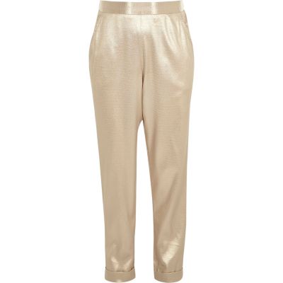 Girls gold metallic jogger style trousers